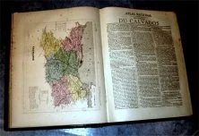 Carte du Calvados de l'Atlas Natioal 1877, non signée. Sur cette carte, il manque la vignette gravée en cartouche représentant l'église St-Pierre à Caen. Elle apparait dans des éditions ultérieures, notamment1896.
